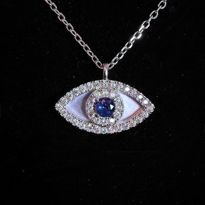 Collier oeil bleu protecteur diamant or blanc - Emirice.com