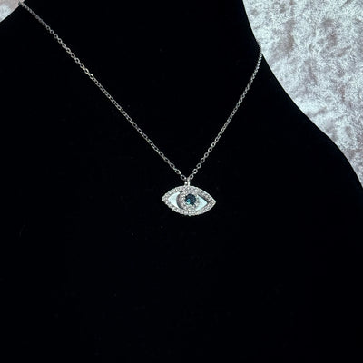 Collier oeil bleu protecteur diamant or blanc - Emirice.com